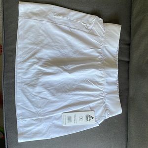 Brand new athletic skirt/skort with inner shorts, zipper pockets